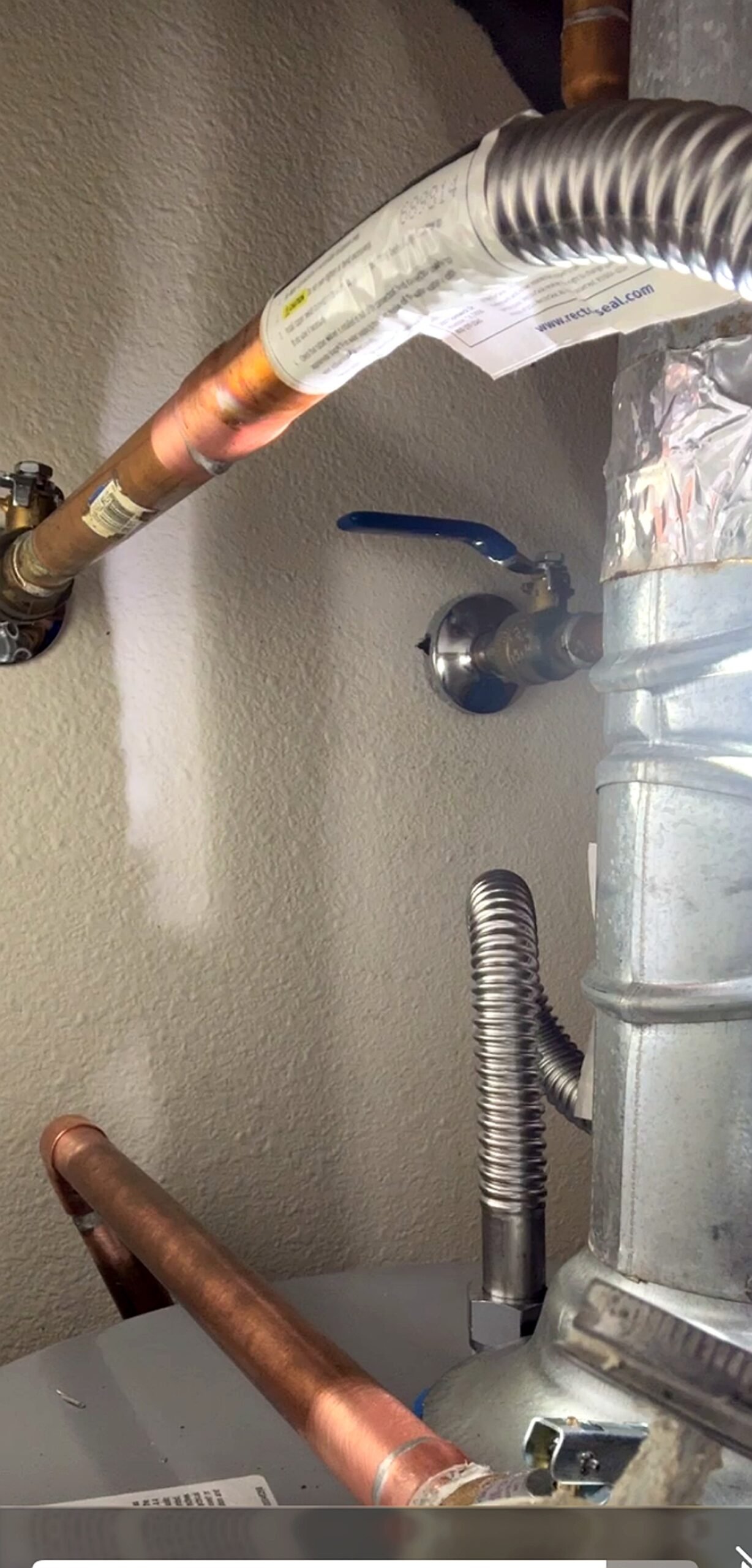 Copper plumbing with shutoff valve installed by Bear Hug Plumbing